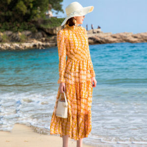 Elegant ladies special occasion dress with gold print